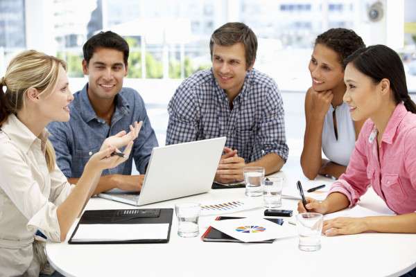 depositphotos_11886437-stock-photo-mixed-group-in-business-meeting
