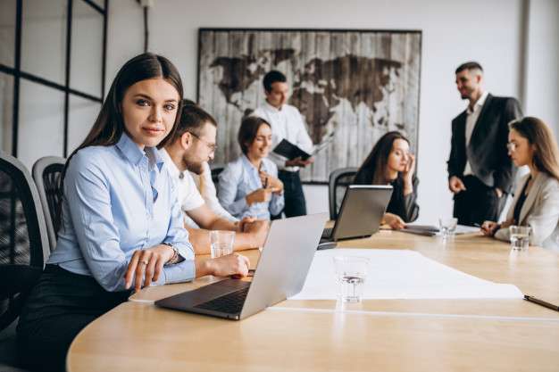 group-people-working-out-business-plan-office_1303-15818