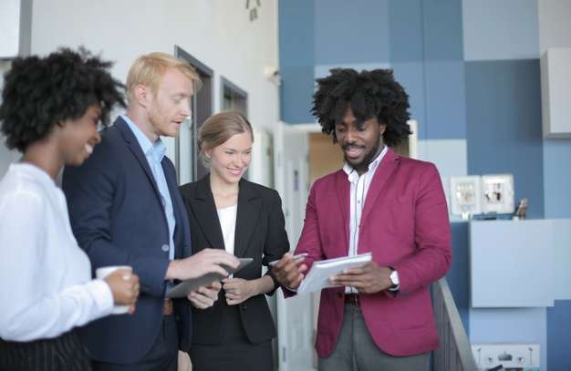 group-successful-diverse-business-partners-having-business-meeting-modern-office_181624-28001