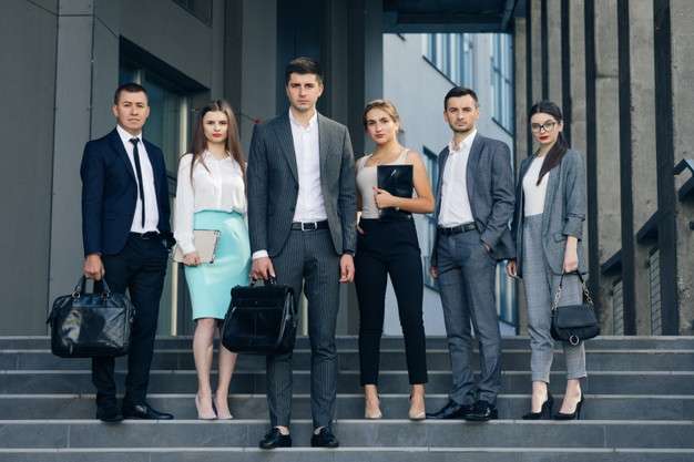 professional-corporate-office-business-team-members-group-look-camera-six-happy-proud-confident-leaders-employees-staff-people-group-stand-together_153228-995